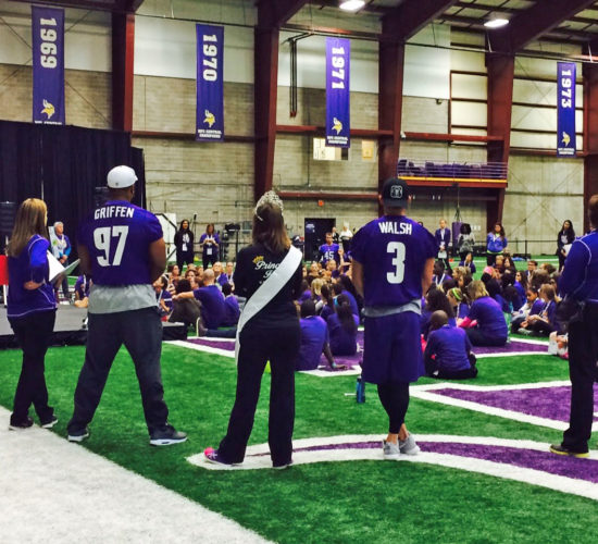 Princess Kay with Vikings players