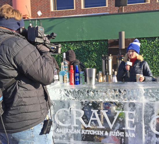 Reporter at a desk made of ice